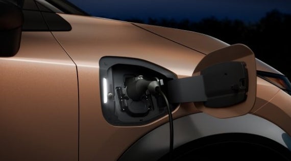 Close-up image of charging cable plugged in | NissanDemo1 in Derwood MD